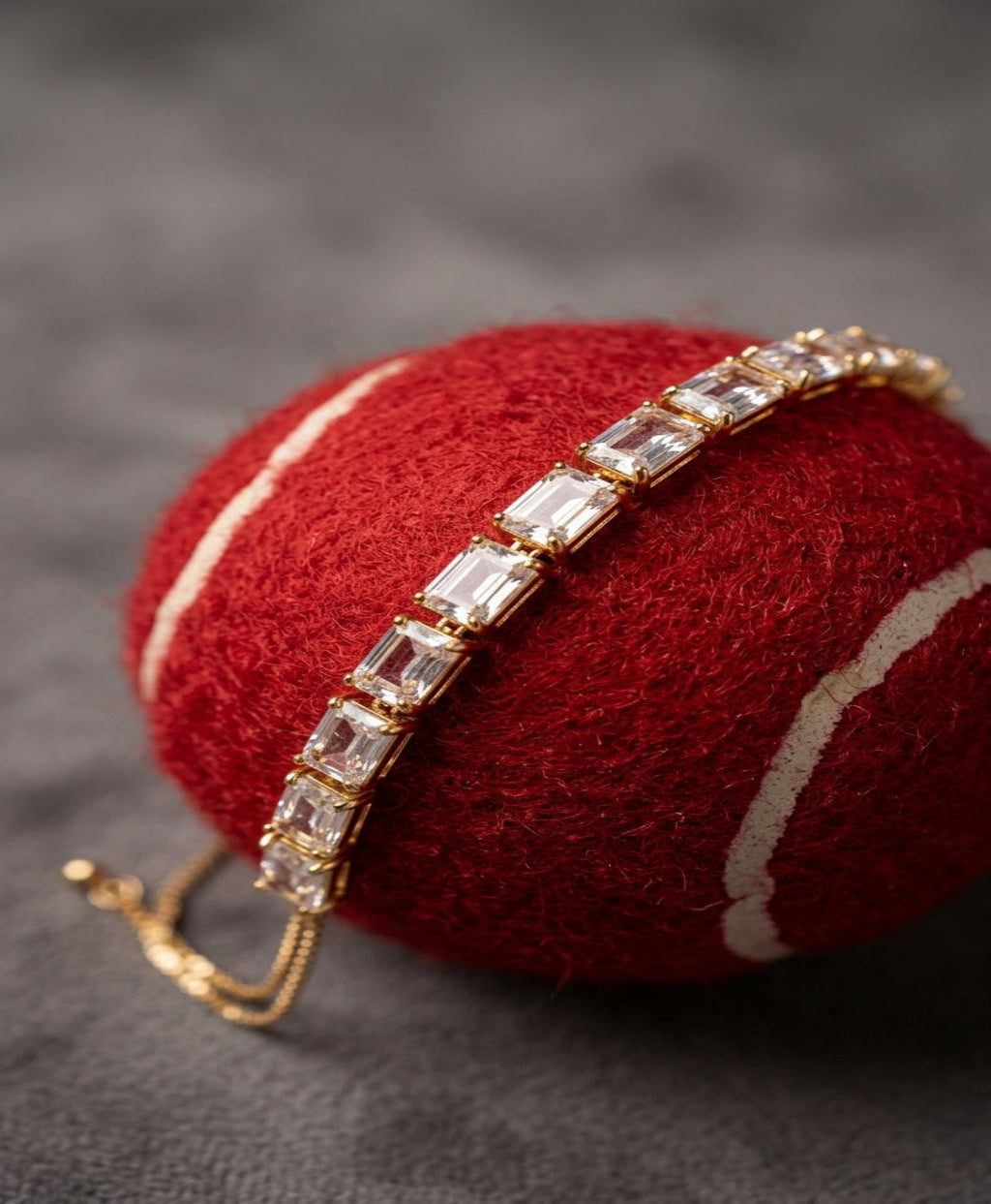 Gold tone Emerald cut tennis bracelet