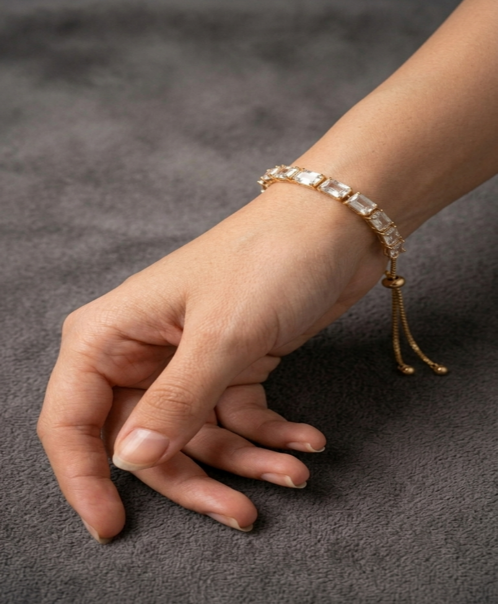 Gold tone Emerald cut tennis bracelet